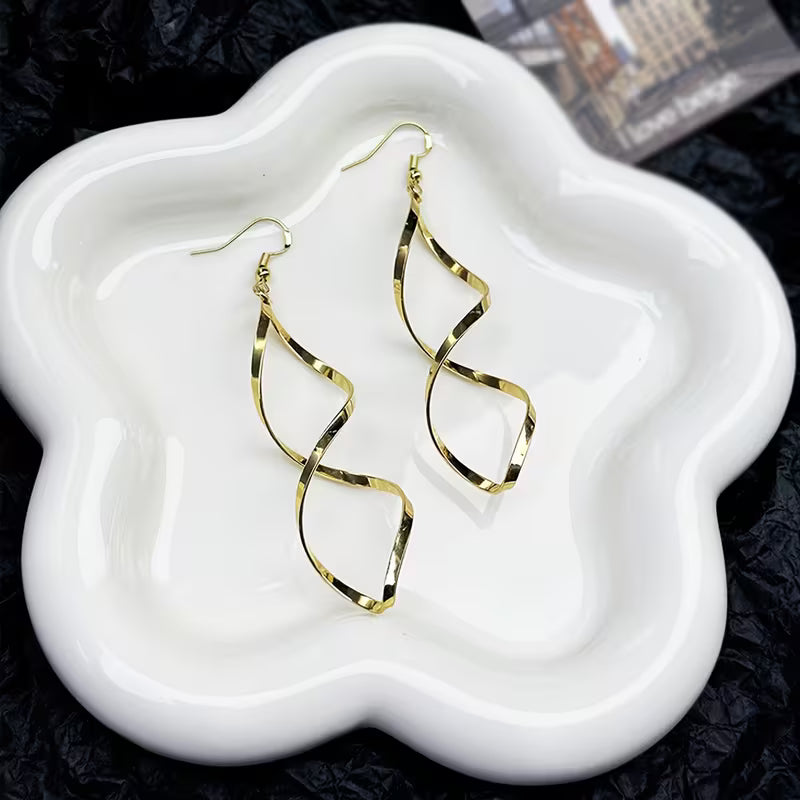 Boucles d'Oreilles Pendantes Spirale | Or