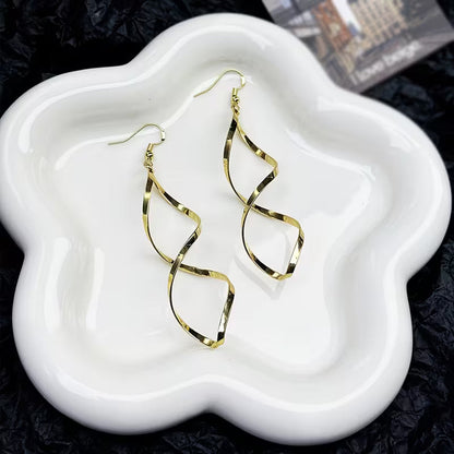 Boucles d'Oreilles Pendantes Spirale | Or