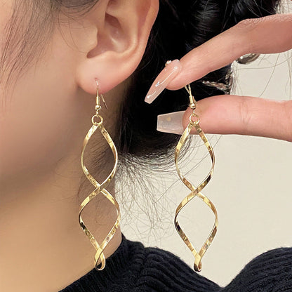 Boucles d'Oreilles Pendantes Spirale | Or