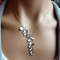 Collier Breloques Pétales Argentées | Or Blanc