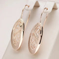 Boucles d'Oreilles Gouttes Dorées Scintillantes | Or
